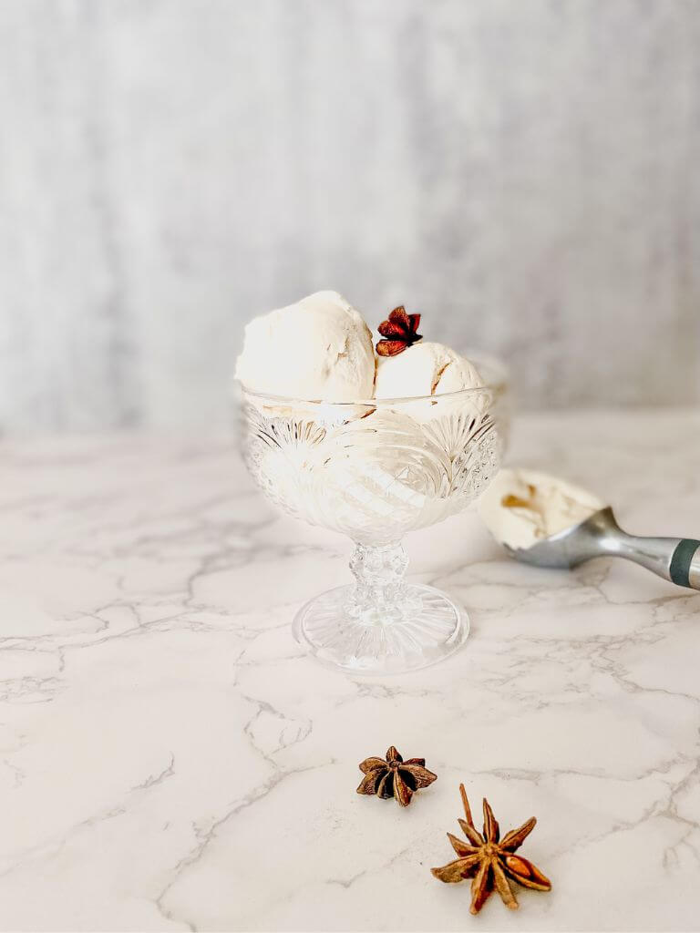 Chai ice cream with three pieces of star anise