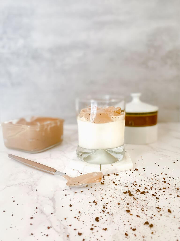 whipped coffee next to a spoon